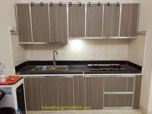 Tủ bếp nhôm cánh hệ zang lee PVC phủ vân gỗ